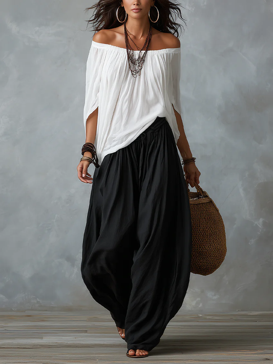 Emilia | Conjunto de top blanco con hombros al descubierto y pantalón acampanado