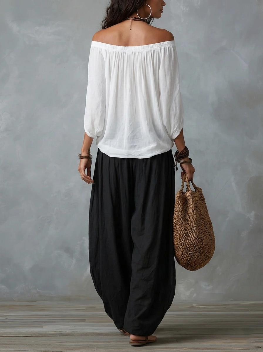 Emilia | Conjunto de top blanco con hombros al descubierto y pantalón acampanado