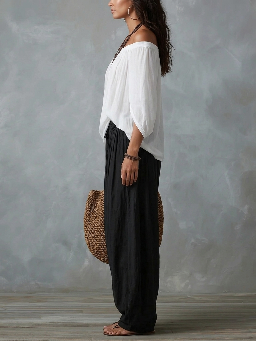 Emilia | Conjunto de top blanco con hombros al descubierto y pantalón acampanado